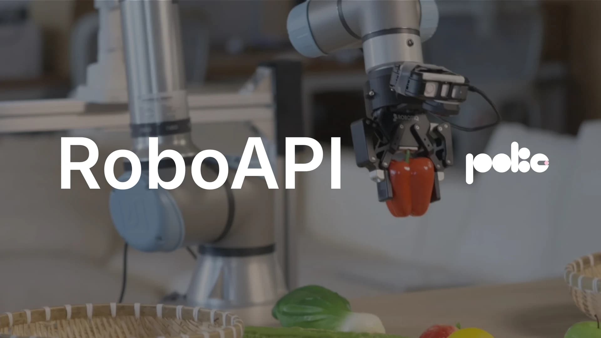 RoboAPI 发布视频封面：机械臂夹起红椒