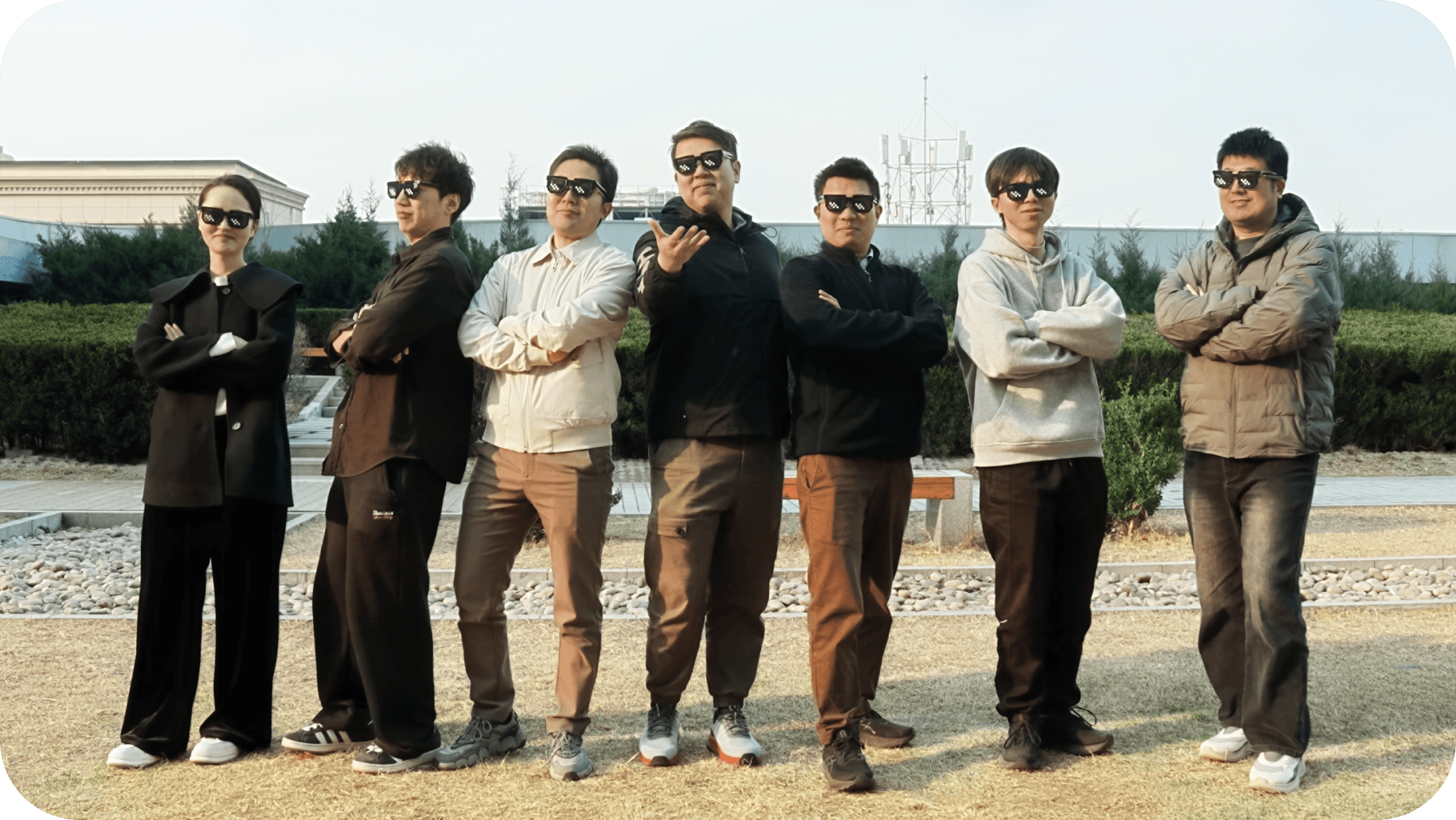 Poke team members posing together outdoors